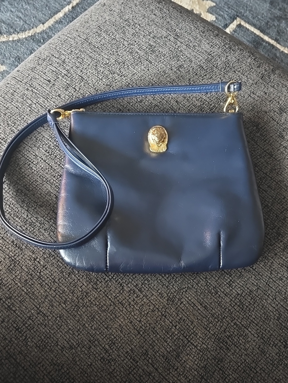 Navy Leather Shoulder Bag with Gold Medallion Accent